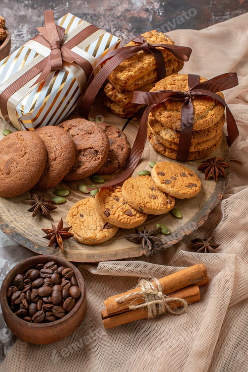 Preview: front view sweet biscuits with nuts and presents on a light background color sugar tea cake cookie