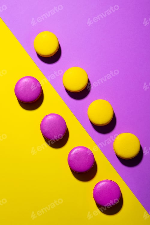 Preview: Macaroons Dessert on Colorful Background. Copy Space. Top view.