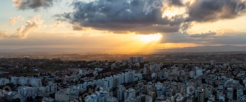 Preview: Netanya, Israel. Aerial City during dramatic Sunrise