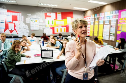 Preview: Group of students learning in classroom