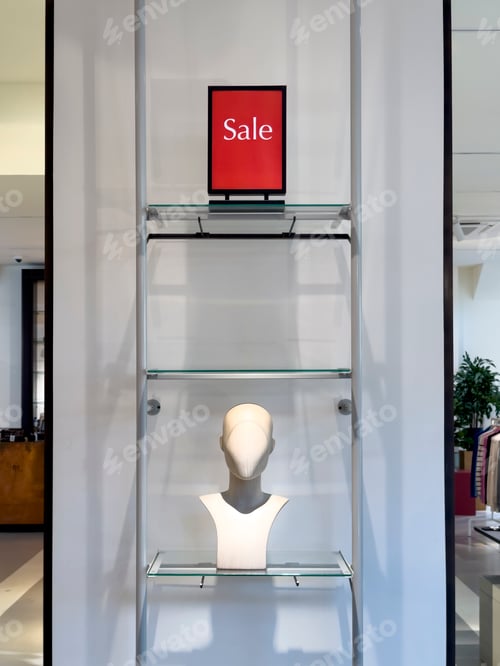 Preview: January sale sign and mannequin in shop