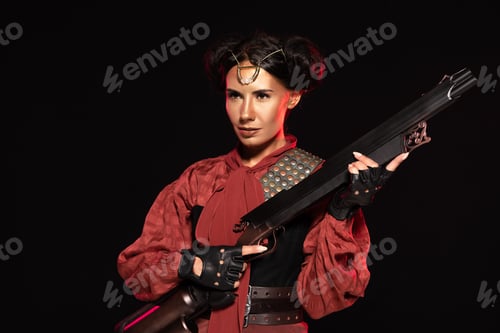 Preview: confident steampunk girl in leather gloves holding gun isolated on black