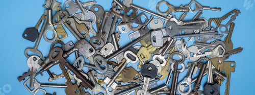 Preview: Keys set on blue background. Door lock keys and safes for property security and house protection