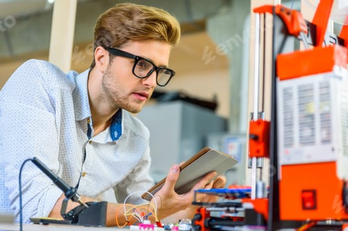 Preview: Skillful Male Engineer Using 3D Printing