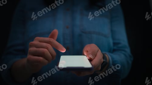 Preview: Close Up Of Woman Using Mobile Phone With Finger Poised Above Screen