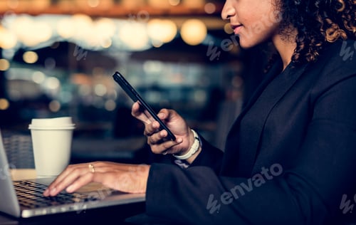 Preview: Woman working on a laptop