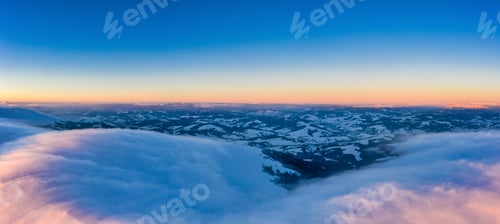 Preview: Picturesque winter panorama of snowy mountain hills