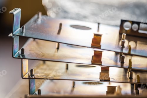 Preview: Metal boards and accessories lie on the surface