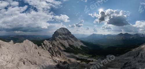 Preview: Scenic Mountain Landscape in Alberta, Canada with Dramatic Clouds and Rocky Terrain