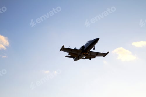 Preview: Private Aircraft landing on a blue sky background