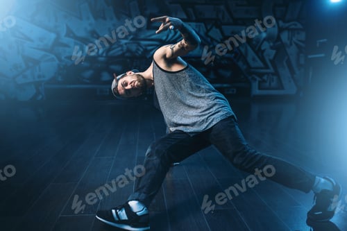 Preview: Breakdance performer posing in dance studio