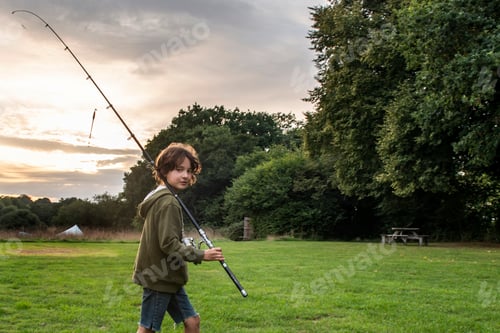 Preview: Boy with fishing rod, Bournemouth, UK