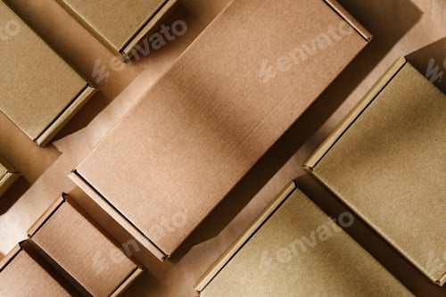 Preview: Multiple cardboard boxes arranged on a surface for packaging and shipping in a warehouse setting