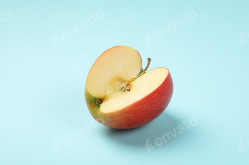 Preview: Ripe apple on blue background, close up