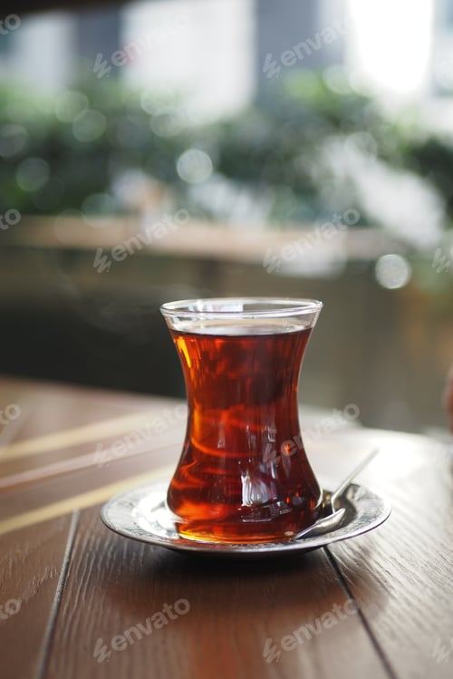 Preview: Traditional turkish tea on white table .