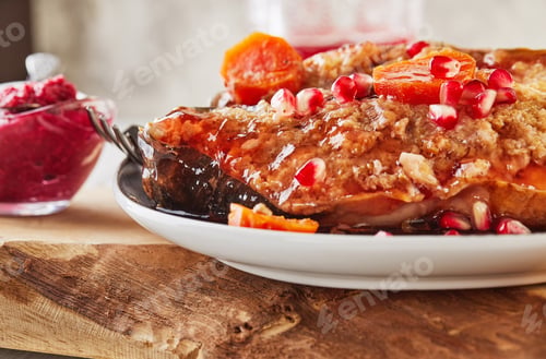 Preview: Gefilte fish with horseradish carrot and pomegranate wine on a wood board