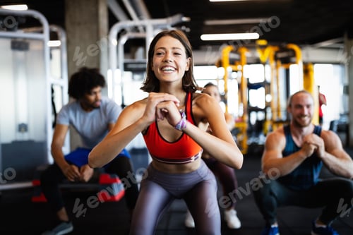 Preview: Close up image of attractive fit woman in gym