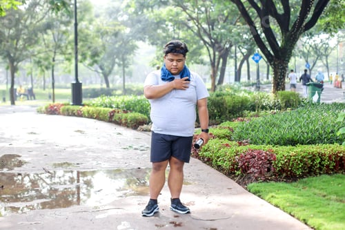 Preview: Overweight Man In Sportswear Walking After Jogging