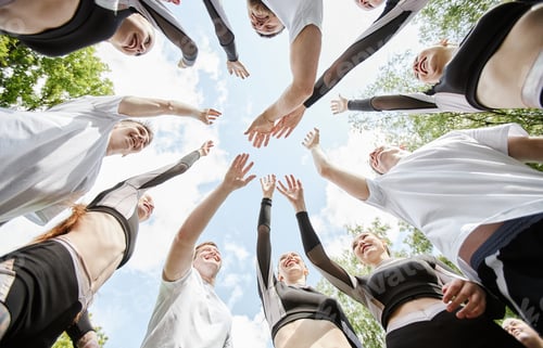 Preview: Team of cheerleaders supporting each other before competition
