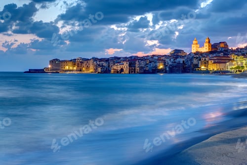 Preview: The city of Cefalu and the local beach at dusk