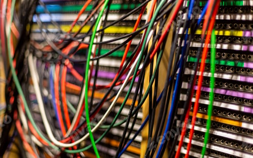 Preview: Close-up of a colorful network server cables and switches in a data center.