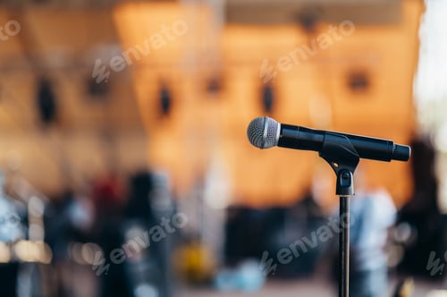 Preview: Microphone on a stage during a concert on a festival