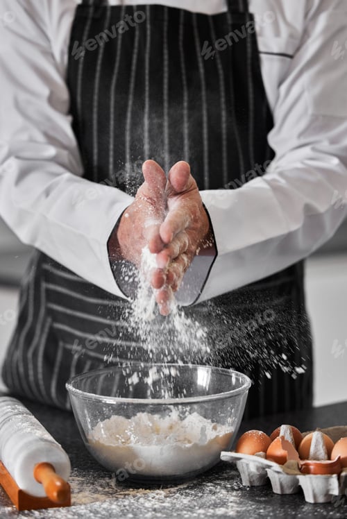 Preview: Have flour, will make pasta. Shot of an unrecognisable man preparing freshly made pasta.