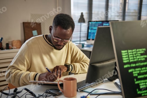 Preview: Developer Writing down Plans for the Day