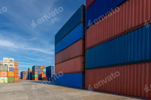 Preview: Stack of containers in a harbor. Shipping containers stacked on cargo ship.