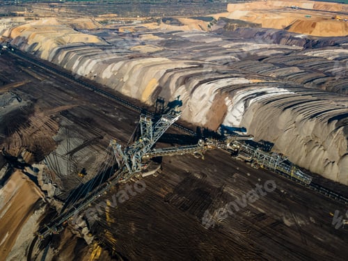 Preview: Mining equipment in a brown coal open pit mine near Garzweiler, Germany. Aerial View