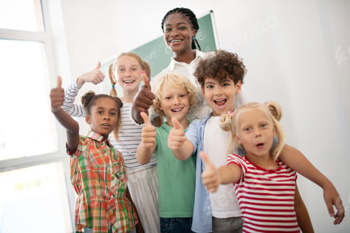 Preview: Children showing thumbs up while feeling amazing after lesson