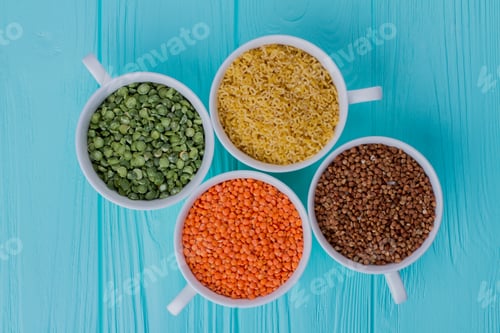 Preview: Dried Foods in White Bowls on Blue Surface