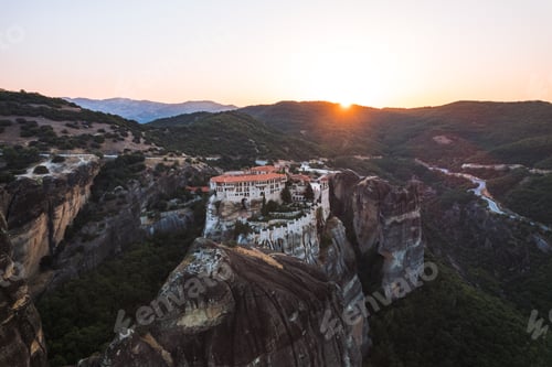 Preview: Aerial Drone View of Monastery in Meteora, Greece Golden Hour Sunset Sunrise