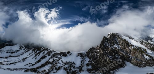 Preview: Canadian Mountain Landscape covered in Clouds. Aerial Nature Background