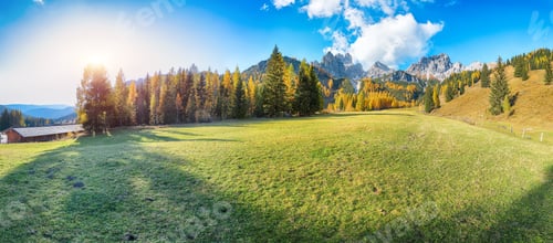 Preview: Astonishing view of mountains and valleys with larch forest and wonderful sky located in Filzmoos