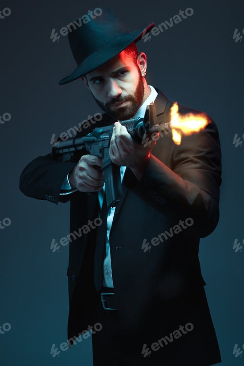 Preview: Man, suit or shooting gun on dark studio background in secret spy, isolated mafia leadership or cri