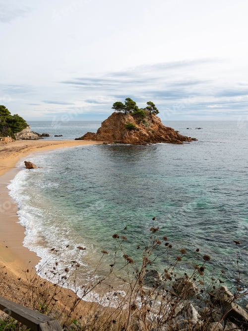 Preview: Costa Brava beach with islet and clear water