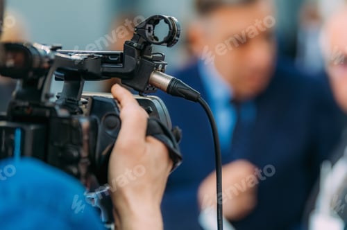 Preview: Media Cameras Rolling at Trade Show Event