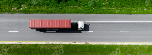 Preview: Aerial view cargo truck on highway logistic cargo transport, Semi truck trailer on highway