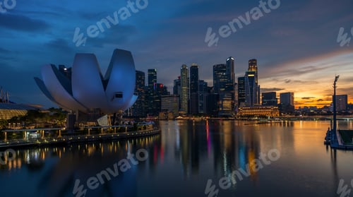 Preview: Landscape view of Singapore business district and city at twilight