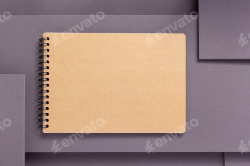 Preview: notebook or notepad at abstract grey background