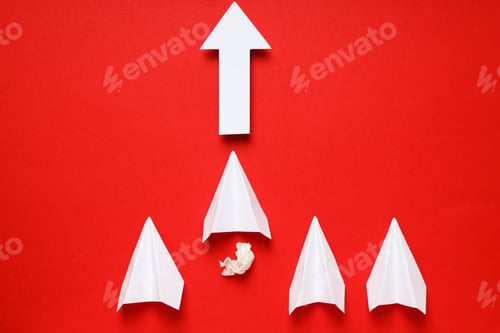 Preview: Business, startup and sponsorship concept with paper planes on red background