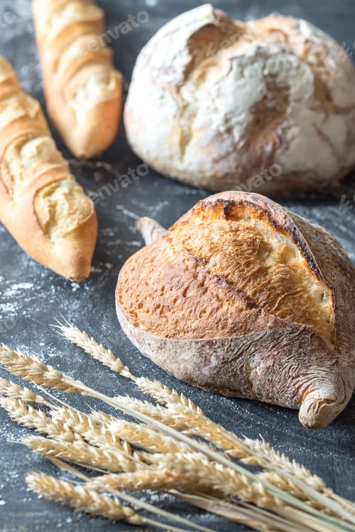 Preview: Different kinds of bread on the wooden background