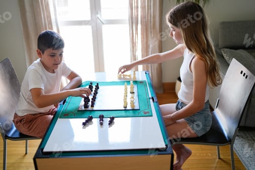 Preview: Two children playing a game of chess