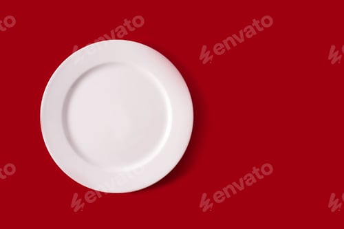 Preview: White plate on red background