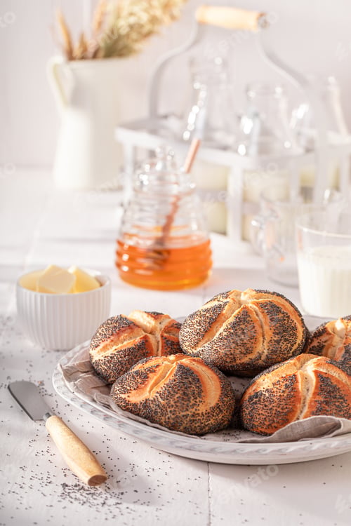 Preview: Homemade Kaiser buns with poppy seed for breakfast.