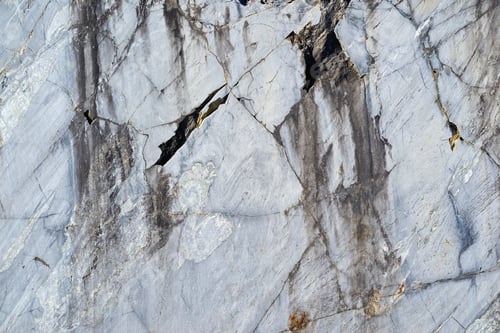 Preview: Abstract Texture Of The Shattered Surface Of Stone Or Marble For A Closeup Background