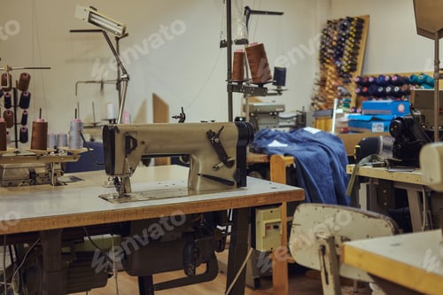 Preview: Image of a tailor's workplace with a sewing machine at a sewing workshop.