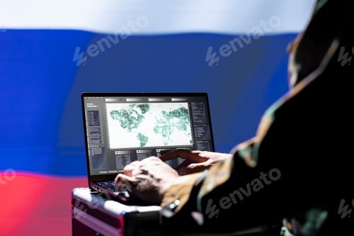 Preview: Hacker Using Laptop for Cyber Crime Activity