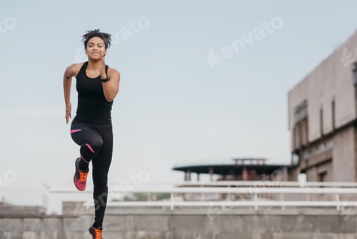 Preview: Morning run and workout. Happy african american girl in sportswear and sneakers, with fitness
